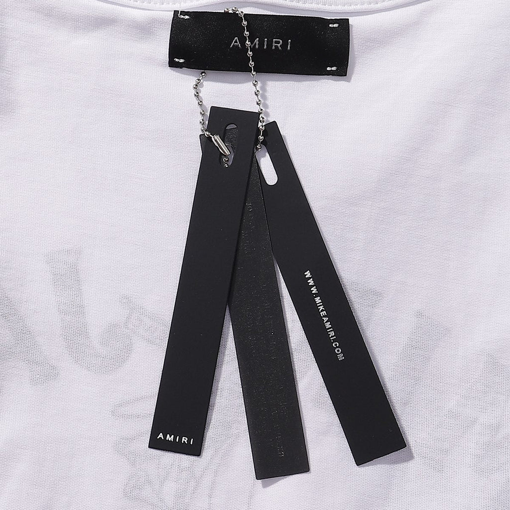 AMIRI Los Angeles Paint-Splatter Graphic T-Shirt ¡ª hang_tag